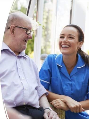 A carer sharing a happy moment with a client
