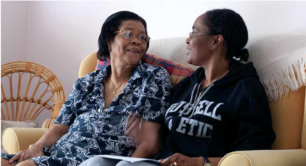 Companionship — two friends chatting at home